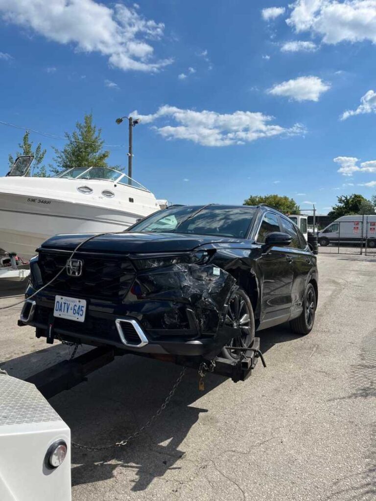 Maiwand Towing tow truck providing emergency towing services in Milton, Ontario.